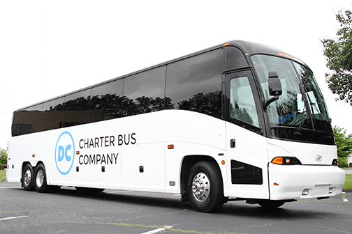 a plain white charter bus with a 