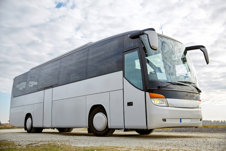 a charter bus prepares for departure on a school trip in washington, dc